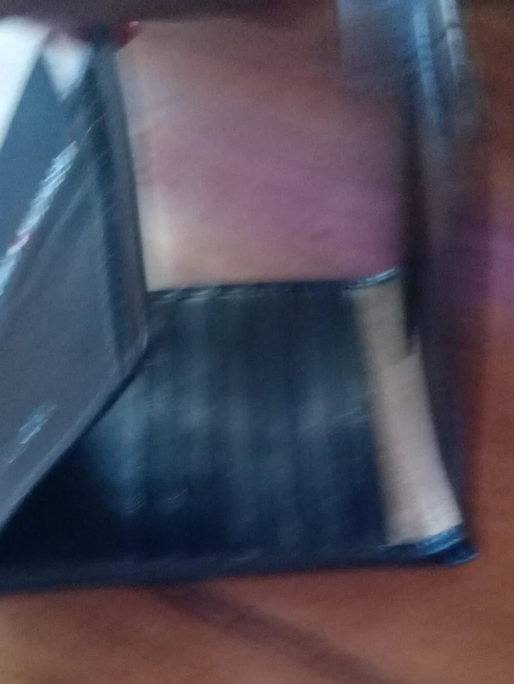 Tommy Hilfiger Black Embossed Leather Bi-Fold Wallet
